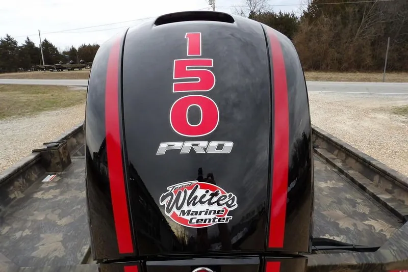 Slide: The Image of 2026 Crestliner 2070 Retriever SCHD with 150 Pro outboard motor, White's Marine Center logo. - 34