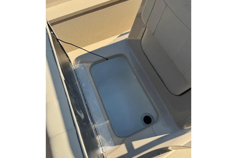 Slide: The Image of Open storage compartment in 2026 G3 Bay 17 boat, featuring a sleek design. - 10