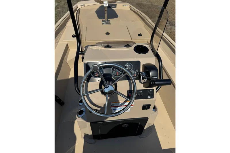 Slide: The Image of Steering console of 2026 G3 Bay 17 boat with gauges and controls. - 11