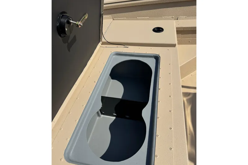 Slide: The Image of 2026 G3 Bay 17 boat storage compartment with open lid, showcasing interior design. - 5