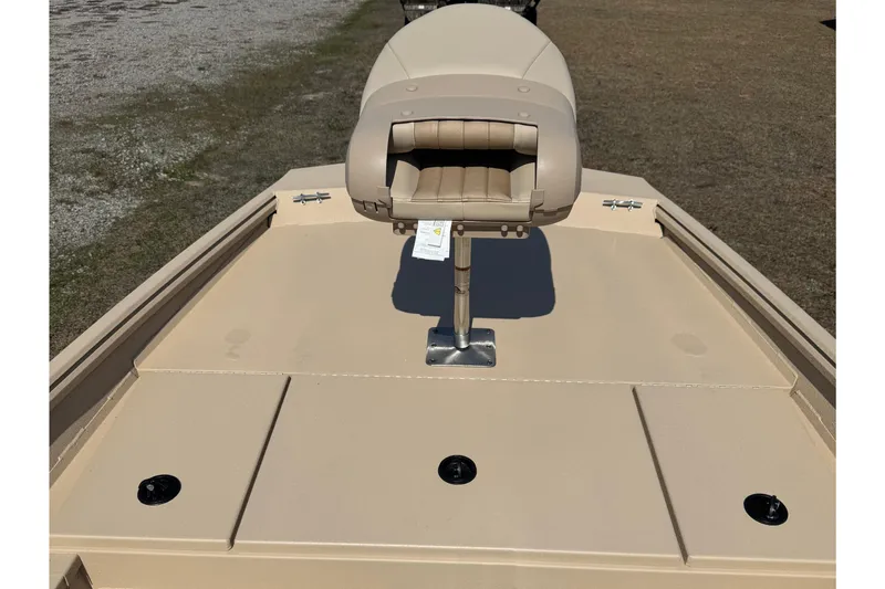 Slide: The Image of 2026 G3 Bay 17 boat deck with beige seating and storage compartments. - 8