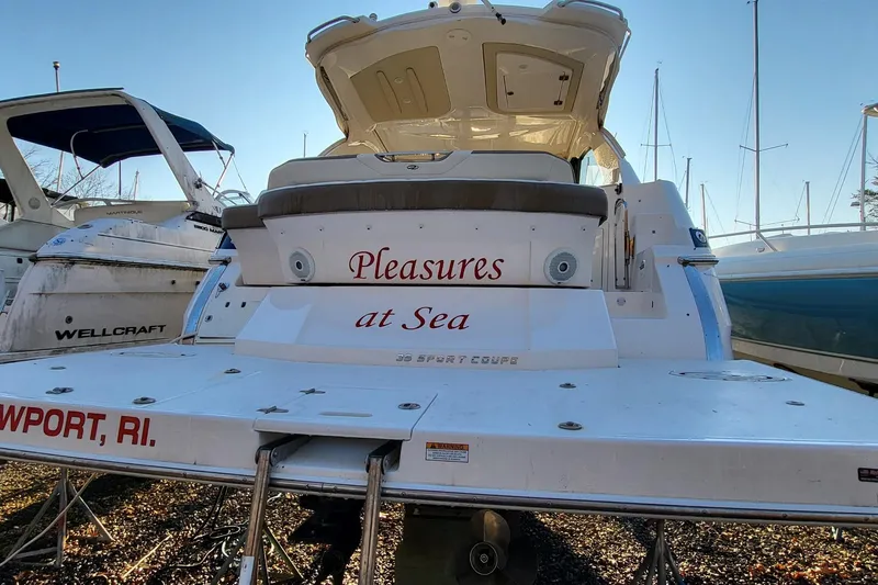 Slide: The Image of 2018 Regal 35 Sport Coupe boat named "Pleasures at Sea" docked in Newport, RI. - 23