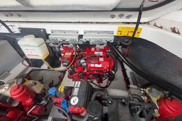 Slide: The Image of Engine compartment of a 2018 Regal 35 Sport Coupe, showcasing detailed mechanical components. - 32