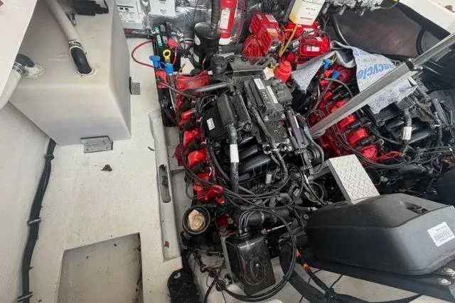 Slide: The Image of Engine compartment of a 2018 Regal 35 Sport Coupe with visible components and wiring. - 34