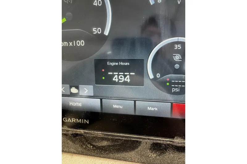 Slide: The Image of Dashboard of 2018 Regal 35 Sport Coupe showing 494 engine hours. - 36