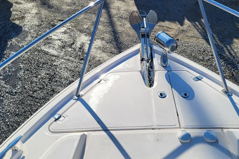 Slide: The Image of Bow of 2018 Regal 35 Sport Coupe with anchor and railings. - 9
