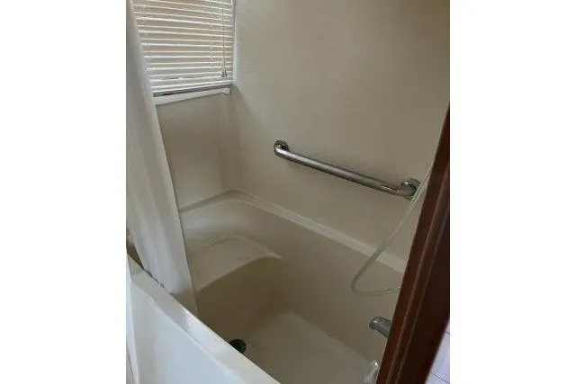 Slide: The Image of Bathtub with grab bar in 1988 Kadey Krogen 42 yacht bathroom. - 15