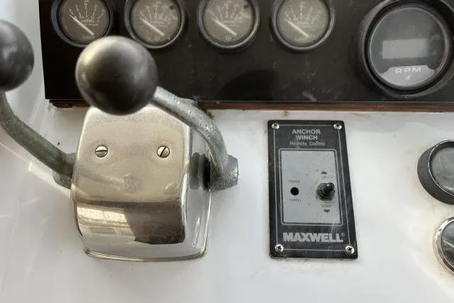 Slide: The Image of Control panel of 1988 Kadey Krogen 42 with Maxwell anchor winch and gauges. - 23