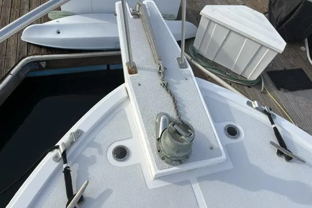 Slide: The Image of Bow of 1988 Kadey Krogen 42 boat with anchor chain and deck fittings. - 31