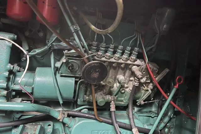 Slide: The Image of Engine components of a 1988 Kadey Krogen 42 boat, showcasing intricate mechanical details. - 37