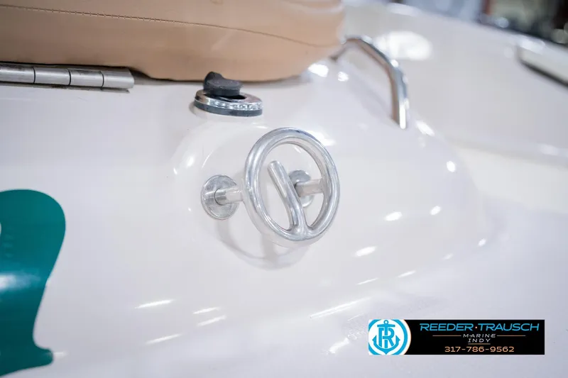 Slide: The Image of Close-up of a 2004 Tahoe 204 boat detail with chrome fittings. - 47