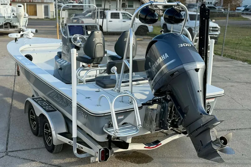 Slide: The Image of 2021 Blazer Bay 2420 boat with Yamaha 300 engine on trailer. - 28