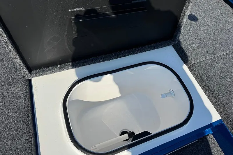 Slide: The Image of Livewell compartment in 2026 Vexus Defender 181 boat, featuring a clean, spacious design. - 13