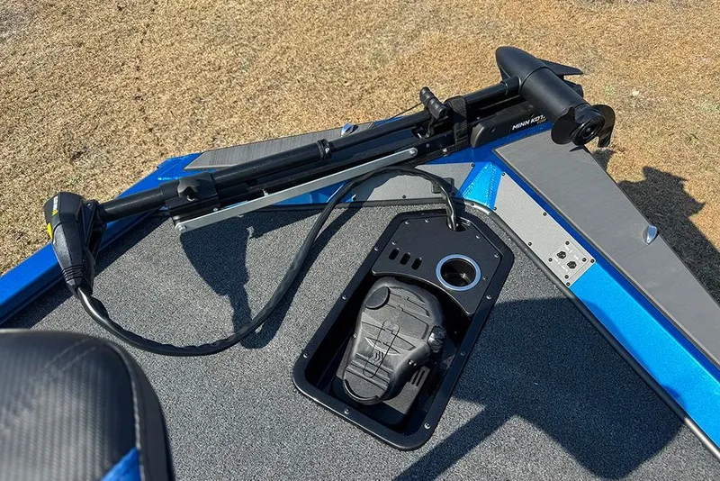 Slide: The Image of 2026 Vexus Defender 181 boat deck with Minn Kota trolling motor and foot pedal. - 15