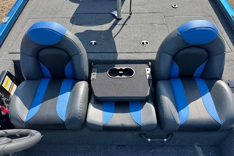 Slide: The Image of 2026 Vexus Defender 181 boat seats with blue and gray upholstery, featuring a central cup holder. - 20