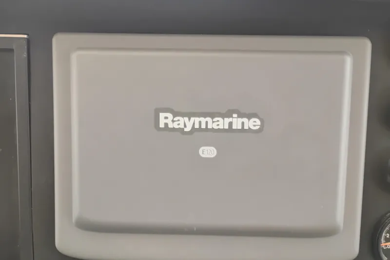 Slide: The Image of Raymarine E120 navigation system on 1977 Custom International Offshore 65 yacht. - 46
