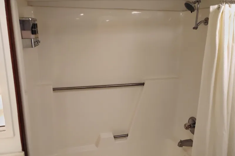 Slide: The Image of Shower area in a 1977 Custom International Offshore 65 yacht bathroom. - 83