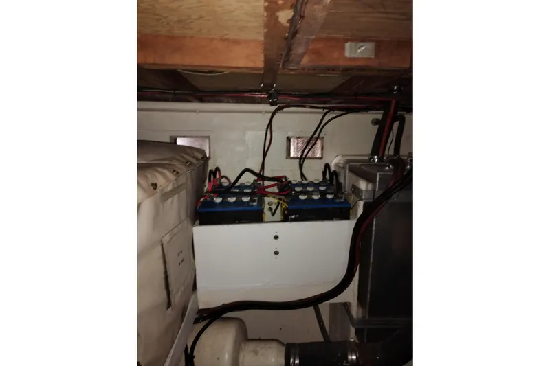 Slide: The Image of Battery compartment of a 1977 Custom International Offshore 65 boat. - 99