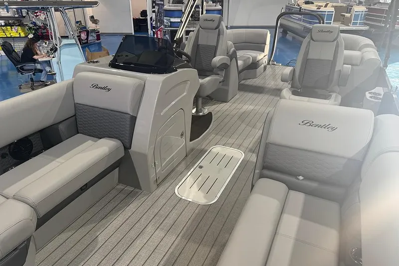 Slide: The Image of 2026 Bentley Pontoons Elite 223 Admiral interior with luxurious seating and modern design. - 10