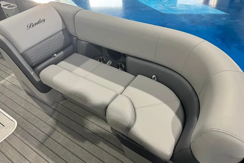Slide: The Image of Luxurious seating on 2026 Bentley Pontoons Elite 223 Admiral, featuring elegant gray upholstery. - 11
