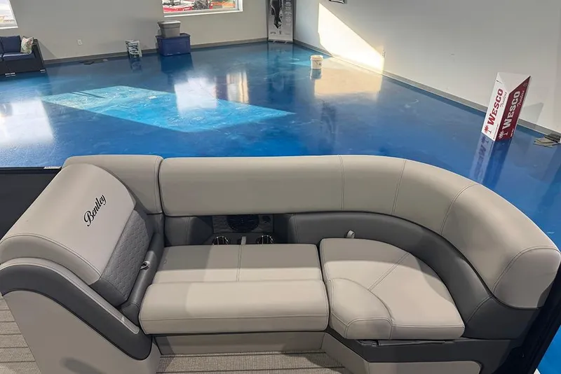 Slide: The Image of Luxurious seating in 2026 Bentley Pontoons Elite 223 Admiral, showroom display. - 12