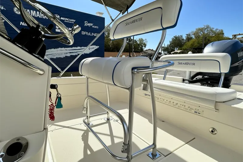 Slide: The Image of Interior of a 2006 ShearWater 2400Z boat with Yamaha engine and seating. - 16