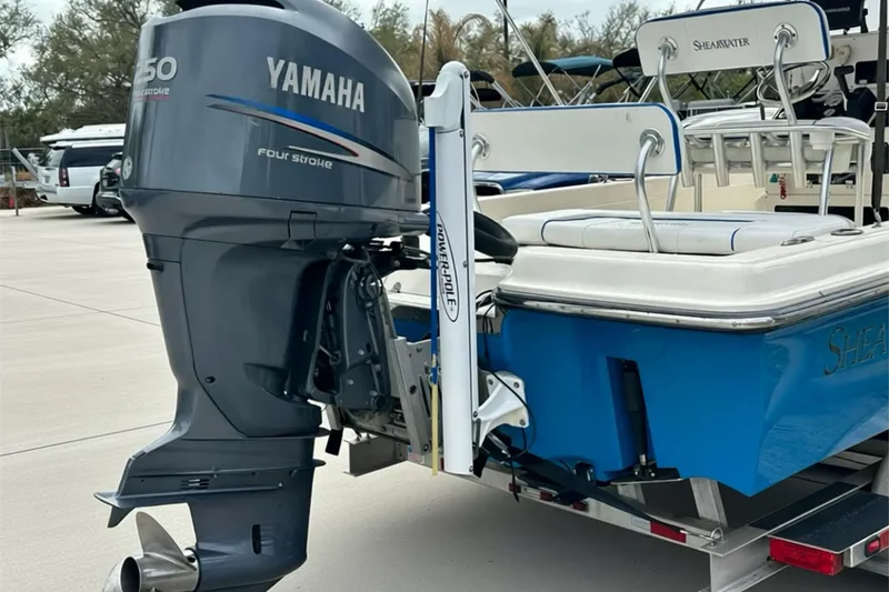 Slide: The Image of 2006 ShearWater 2400Z boat with Yamaha 250 outboard motor on trailer. - 28