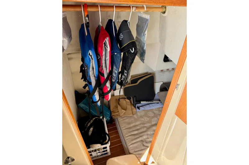 Slide: The Image of Interior of 2012 Ranger Tugs R-29 with life jackets and storage area. - 22