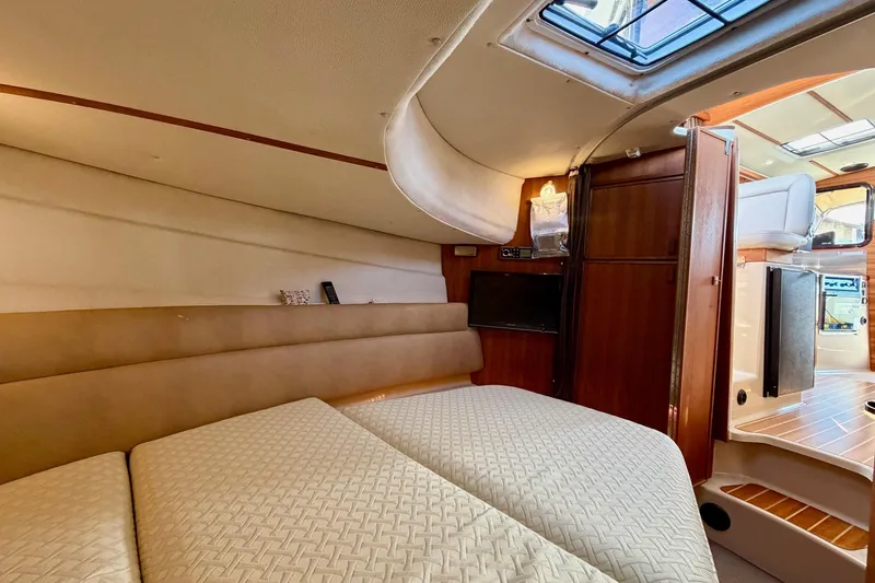 Slide: The Image of Interior of 2012 Ranger Tugs R-29 boat with cozy cabin and modern amenities. - 33