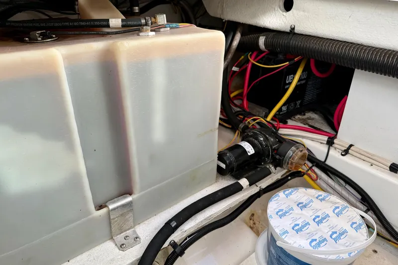 Slide: The Image of Engine compartment of a 2012 Ranger Tugs R-29 with wiring and components. - 44