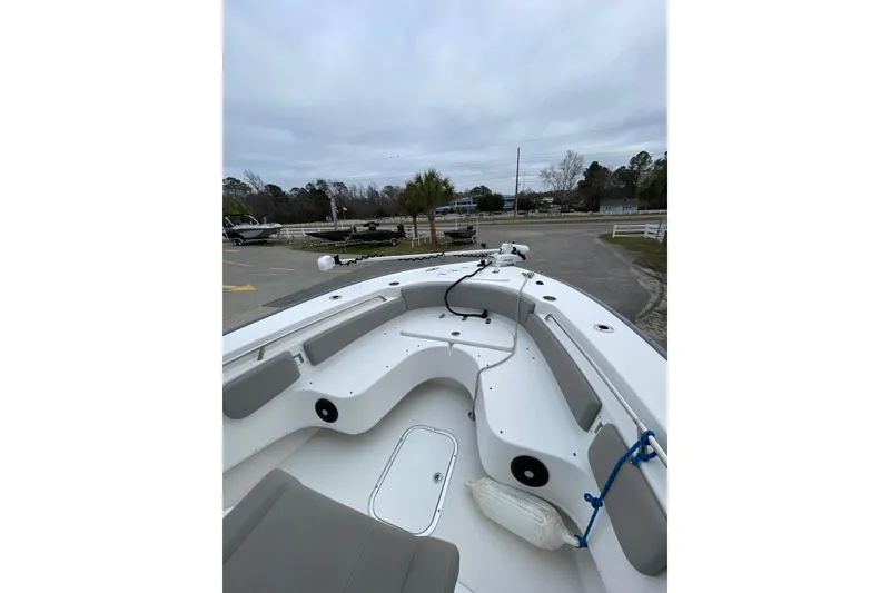 Slide: The Image of 2023 Cape Horn 24 XS boat interior with seating and storage compartments. - 14