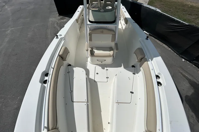 Slide: The Image of 2018 NauticStar 28 XS boat interior with spacious seating and sleek design. - 30