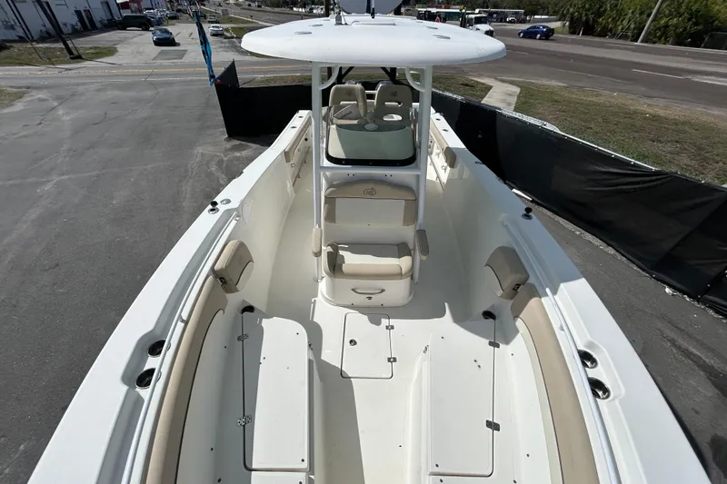 Slide: The Image of 2018 NauticStar 28 XS boat with spacious seating and sleek design. - 31