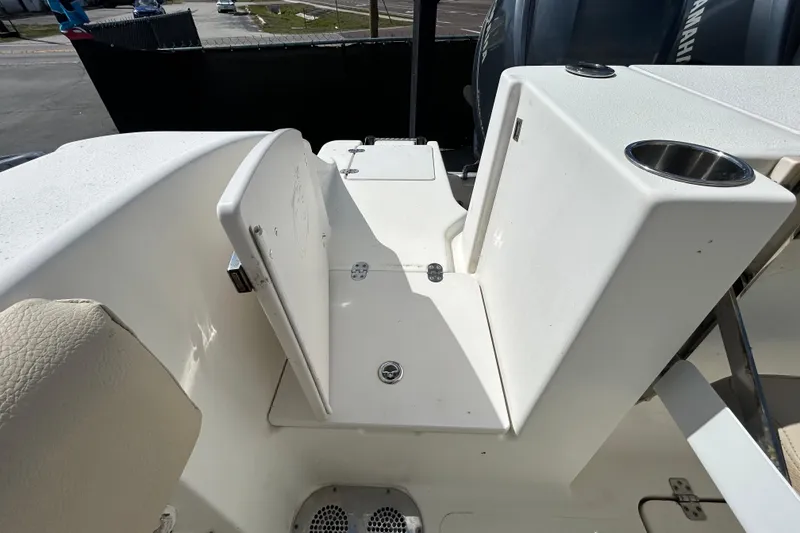 Slide: The Image of 2018 NauticStar 28 XS boat interior with seating and storage compartments. - 39