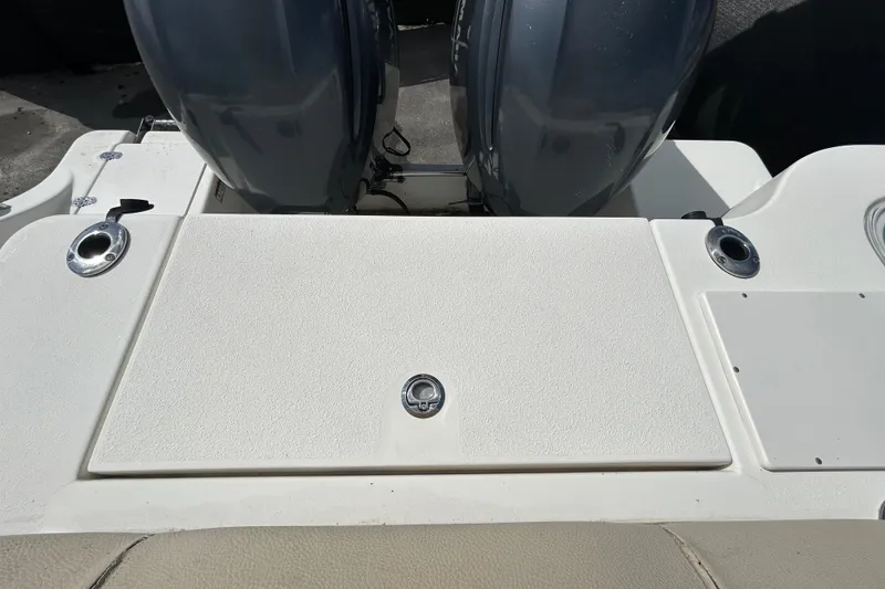 Slide: The Image of 2018 NauticStar 28 XS boat deck with dual outboard motors. - 43