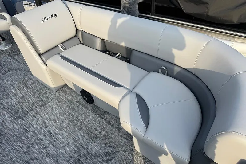 Slide: The Image of 2026 Bentley Pontoons Legacy 243 Swingback interior with luxurious seating and modern design. - 10