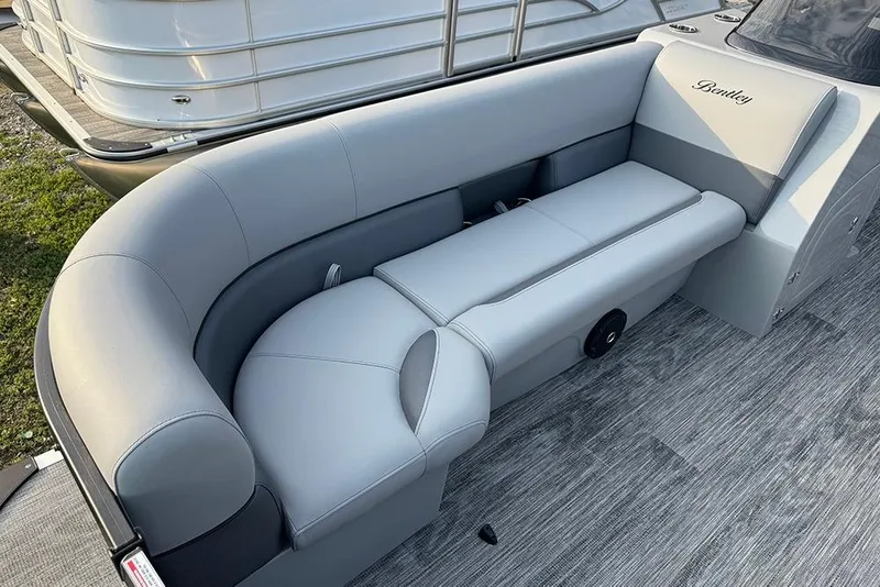 Slide: The Image of 2026 Bentley Pontoons Legacy 243 Swingback with luxurious gray seating and sleek design. - 13