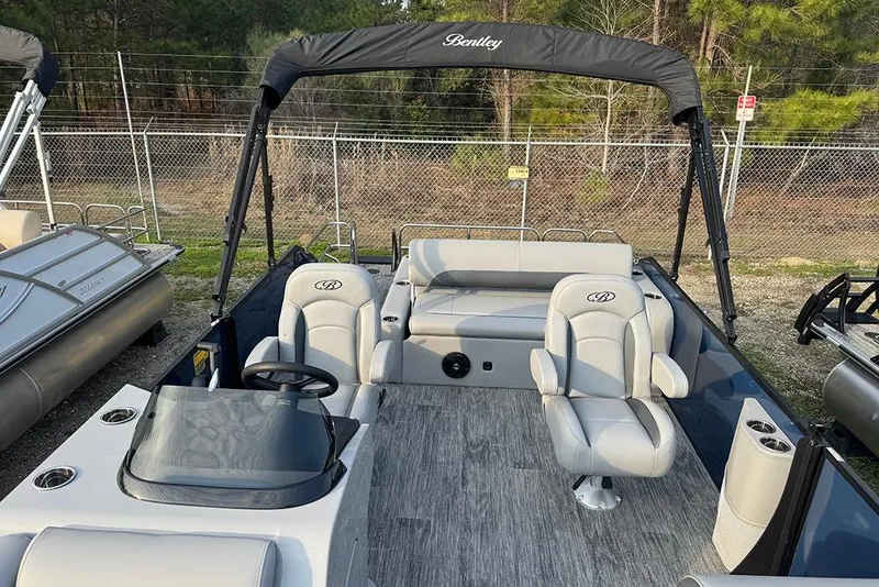Slide: The Image of 2026 Bentley Pontoons Legacy 243 Swingback with sleek seating and modern design. - 15