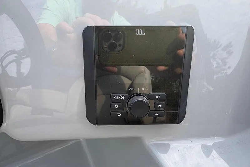 Slide: The Image of JBL audio control panel on 2026 Bentley Pontoons Legacy 243 Swingback. - 19