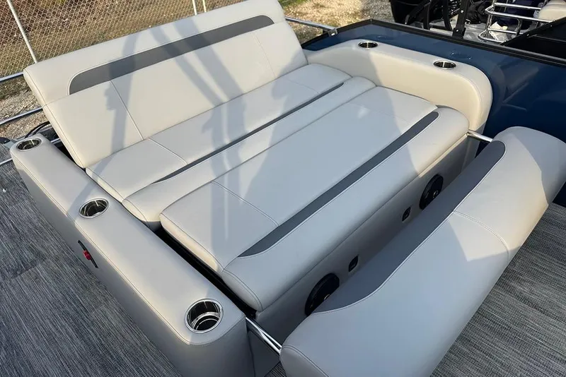 Slide: The Image of 2026 Bentley Pontoons Legacy 243 Swingback with luxurious seating and cup holders. - 25