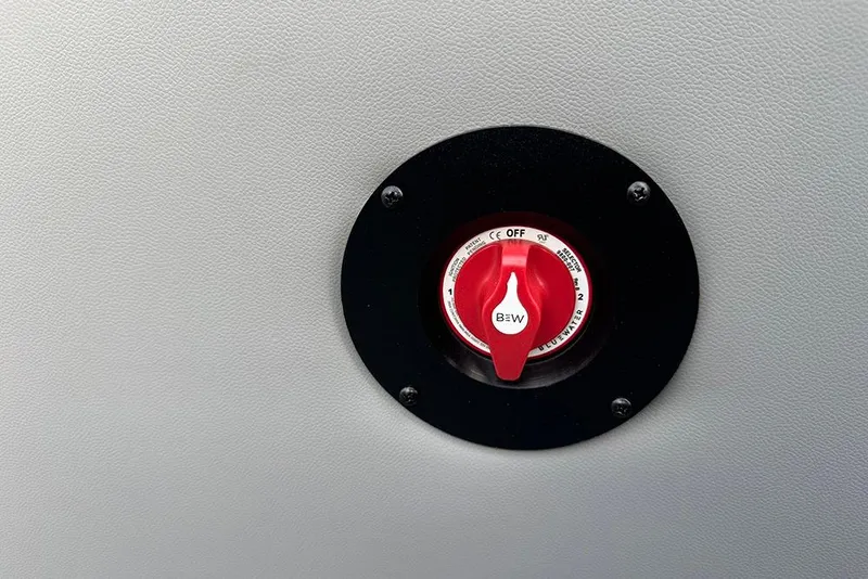 Slide: The Image of Red switch on Bentley Pontoons Legacy 243 Swingback 2026, mounted on a textured surface. - 29