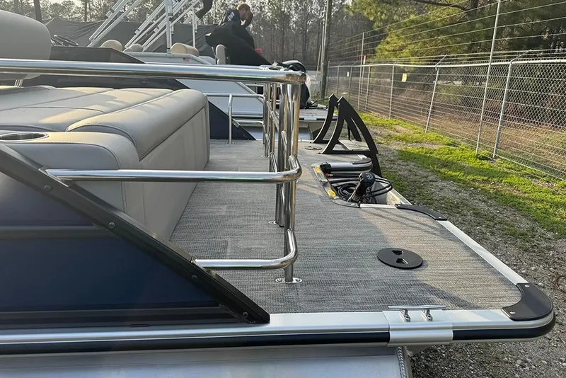 Slide: The Image of 2026 Bentley Pontoons Legacy 243 Swingback with sleek seating and modern design. - 6