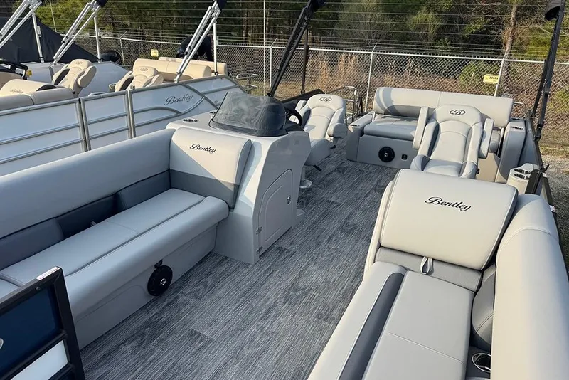Slide: The Image of 2026 Bentley Pontoons Legacy 243 Swingback with luxurious seating and modern design. - 9