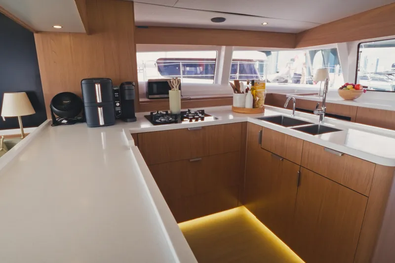 Slide: The Image of Modern kitchen interior on Bali 5.2 yacht, featuring sleek countertops and appliances, 2026 model. - 15