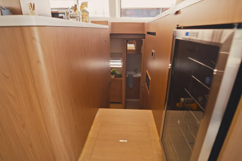 Slide: The Image of Modern interior of 2026 Bali 5.2 yacht with wooden cabinetry and sleek design. - 16