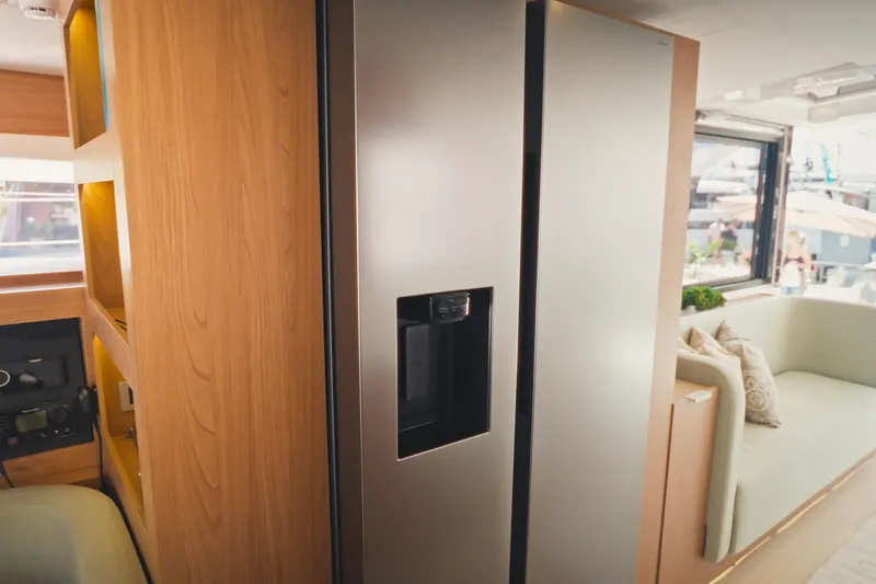 Slide: The Image of Modern interior of Bali 5.2 yacht, featuring sleek kitchen and cozy seating area, 2026 model. - 18