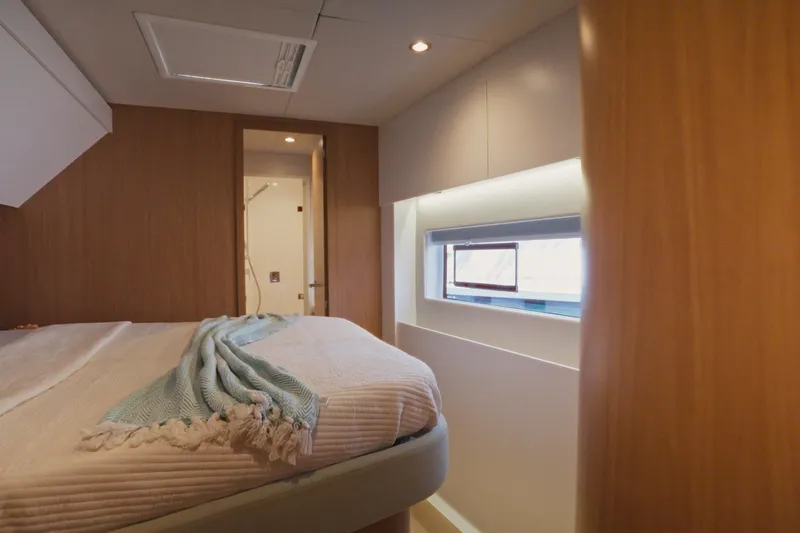 Slide: The Image of Luxurious cabin interior of 2026 Bali 5.2 yacht with cozy bed and modern design. - 21