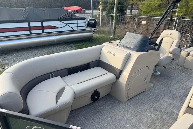 Slide: The Image of 2026 Bentley Pontoons Legacy 223 Swingback with luxurious seating and modern design. - 12