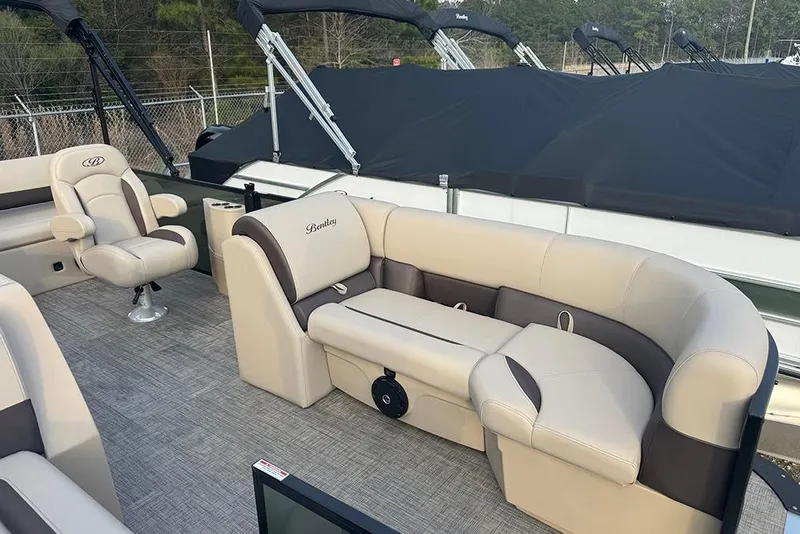 Slide: The Image of 2026 Bentley Pontoons Legacy 223 Swingback interior with luxurious seating and modern design. - 13