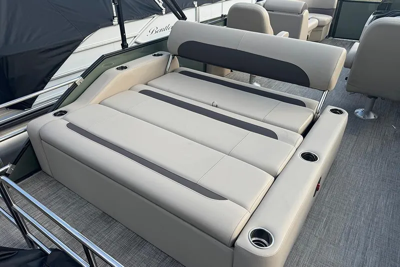 Slide: The Image of 2026 Bentley Pontoons Legacy 223 Swingback with luxurious seating and cup holders. - 27